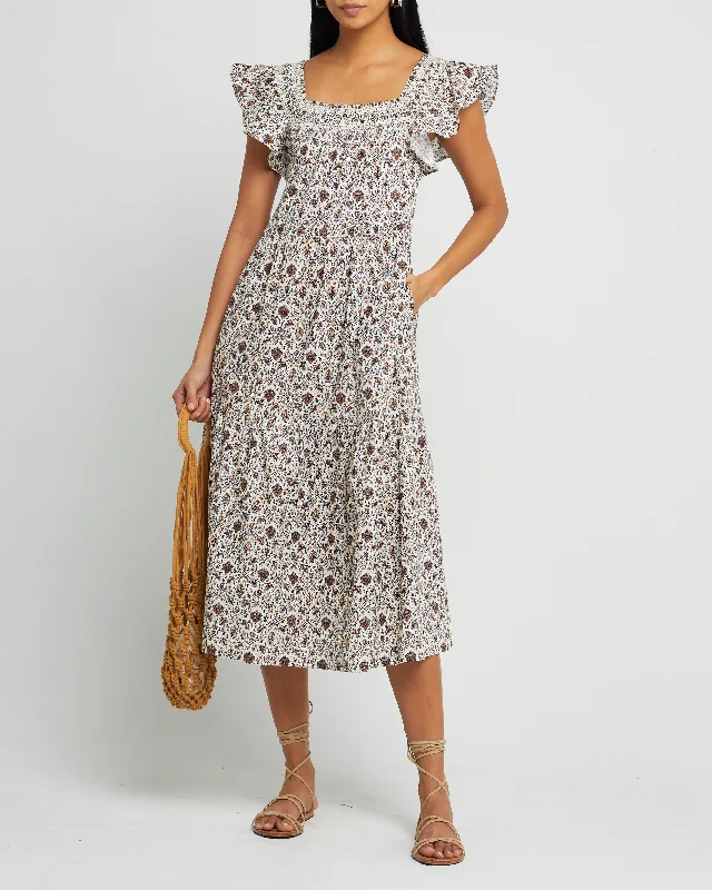 Midi dresses with V - necklines for a flattering and elongating effectAnja Maxi Dress