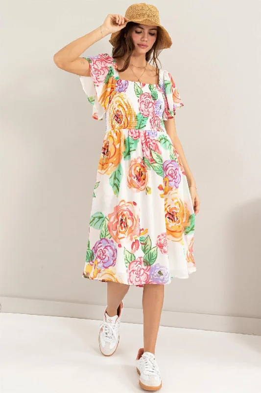 High - low midi dresses with geometric patterns for a modern partyFloral Flutter Sleeve Smocked Dress