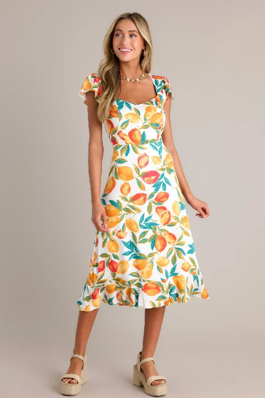Midi dresses with abstract art prints for an artistic statementSunshine & Bliss Ivory Multi Citrus Print Midi Dress