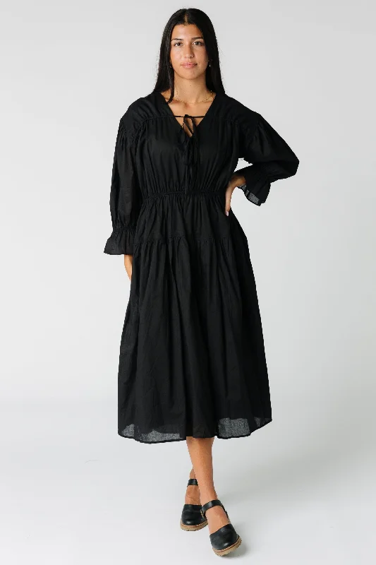 Midi dresses with ruffled bodices for a more pronounced feminine lookThe Abbey Dress