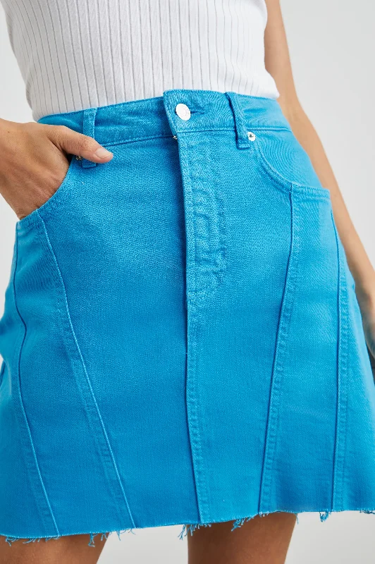 Denim Top with a Collared Neckline for a Preppy StyleBRENTWOOD SKIRT - AQUARIUS RAW HEM