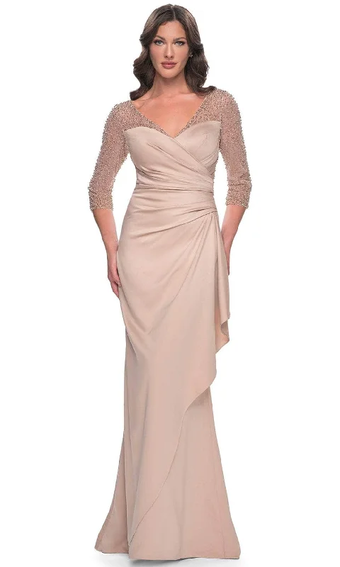 Wedding guest dresses with fringe accents for a bohemian - inspired weddingLa Femme 31011SC - Beaded Illusion Quarter Sleeve Evening Gown