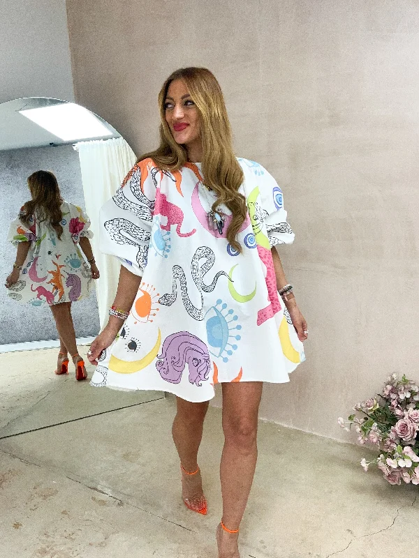 Mini dresses with spaghetti straps for a delicate lookSpellbound Puff Sleeve Swing Dress In White Mystical Print