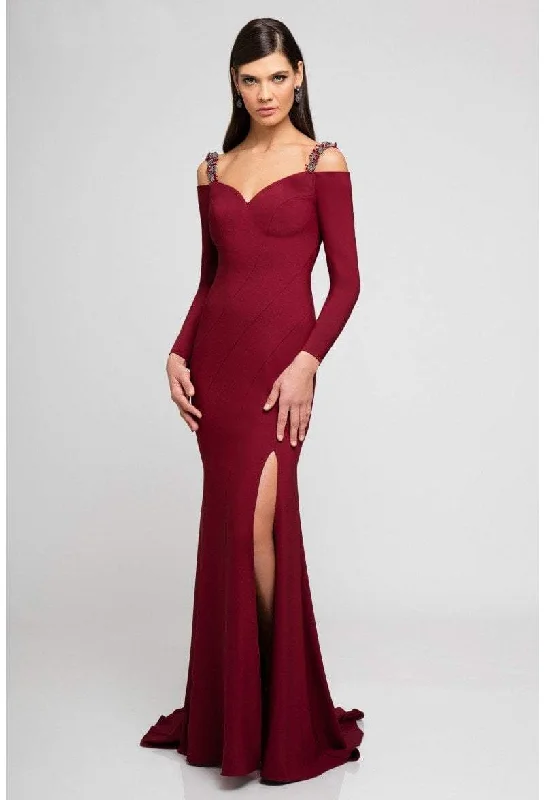 Bow - backed wedding guest dresses in silk for a luxurious feelTerani Couture - 1723E4502 Cold Shoulder Long Sleeve Sheath Gown