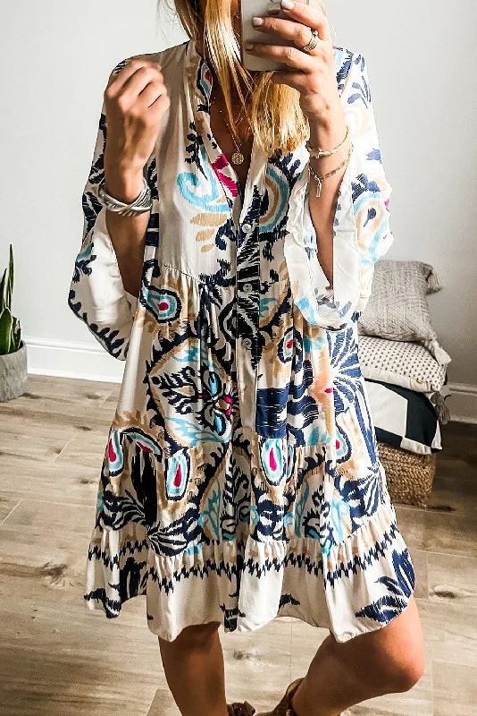 Floral print mini dresses for summer partiesWhite Printed Tribal Bracelet Sleeve Buttoned Mini Dress