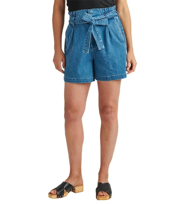 Ruffled Hem Women Shorts to Add a Feminine TouchHigh Rise Belted Pleated Paperbag Short In Blue Nova Ruffled Hem Women Shorts to Add a Feminine TouchHigh Rise Belted Pleated Paperbag Short In Blue Nova